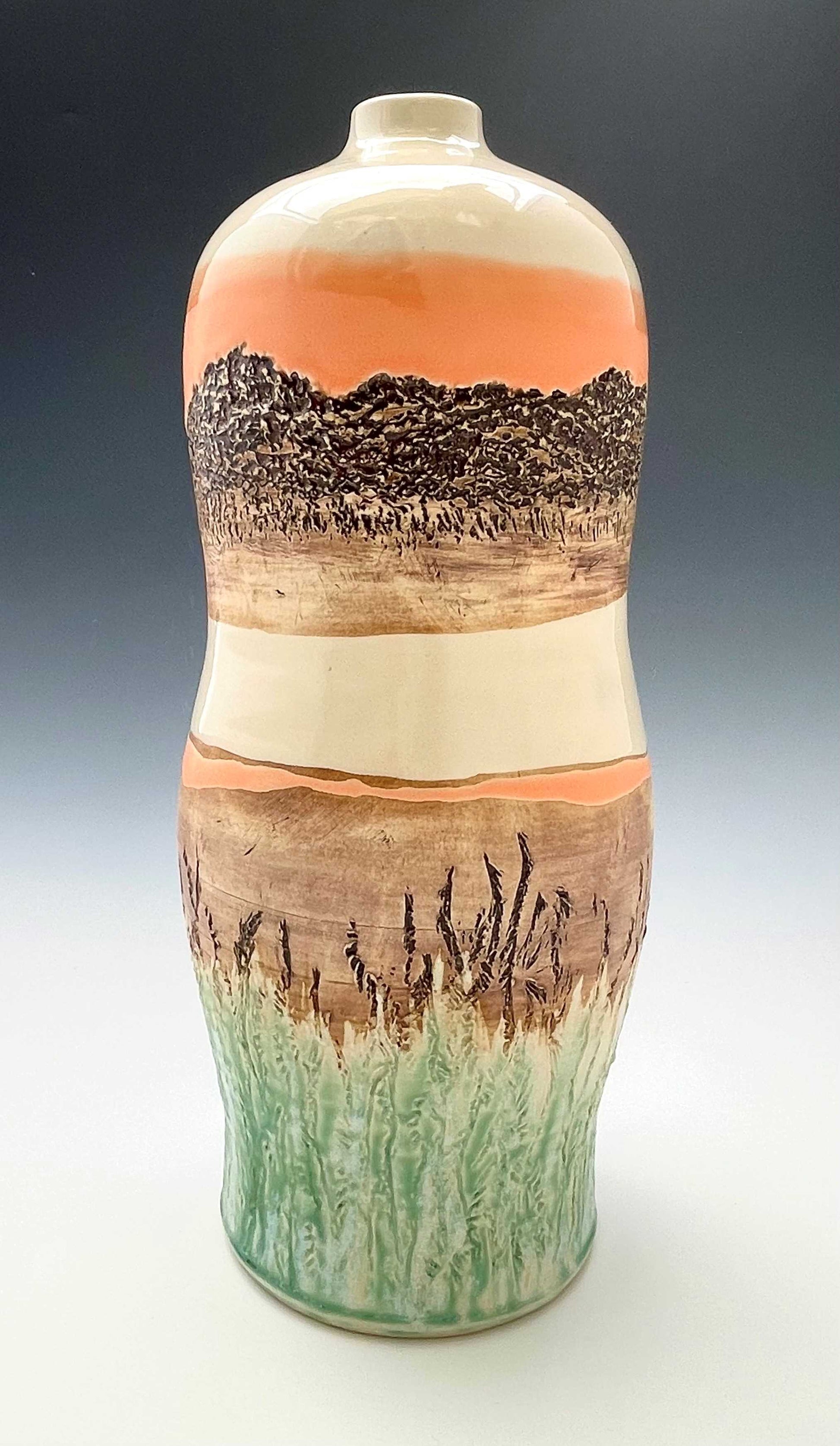 Tall wheel-thrown porcelain vase with coral, brown, white and light green glazes and a textured surface, representing a river sunset scene
