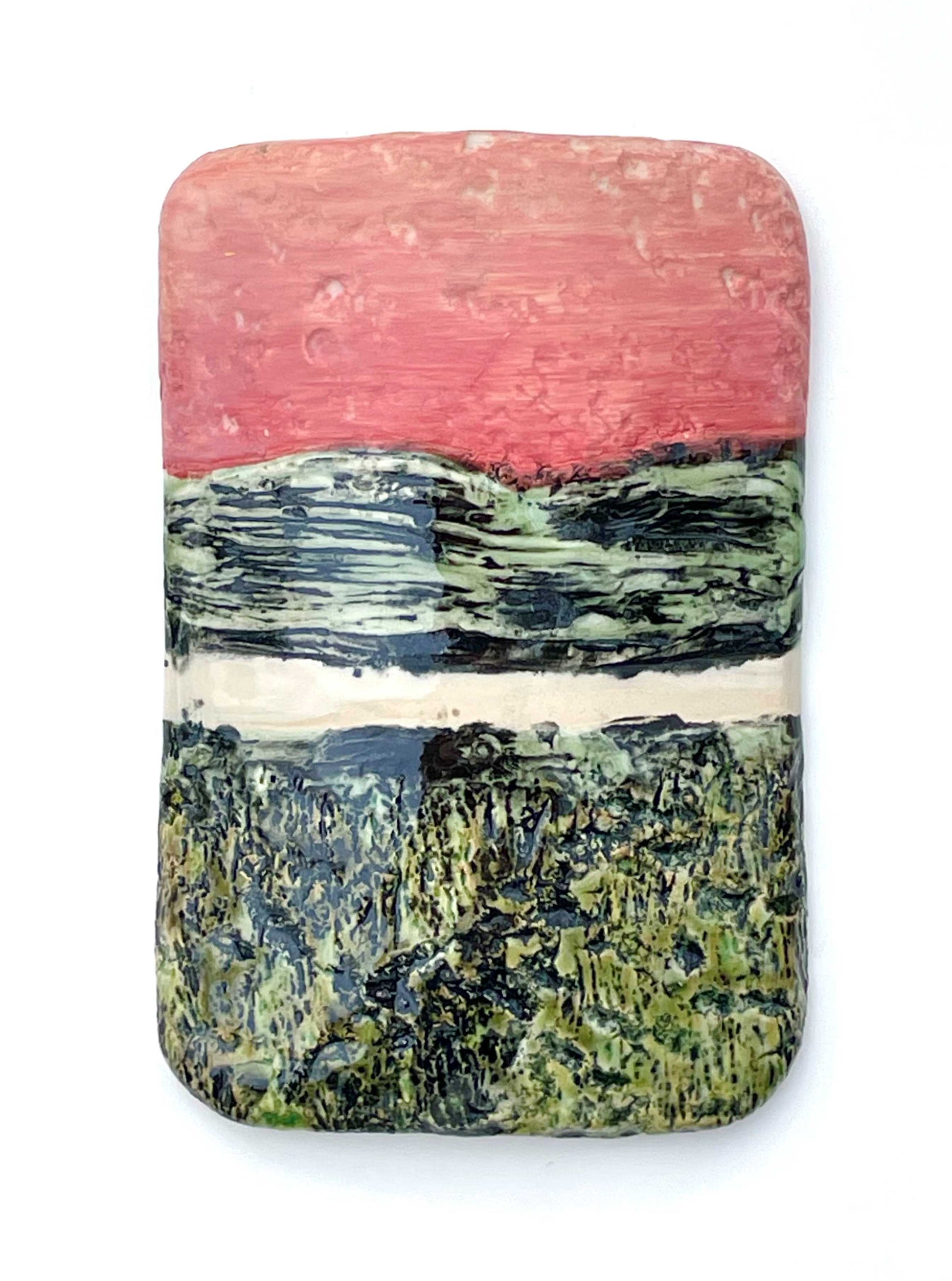 Rectangular porcelain wall-hung sculptural tile with coral, white and black and green glazes on a textured surface, representing an abstract sunset river scene